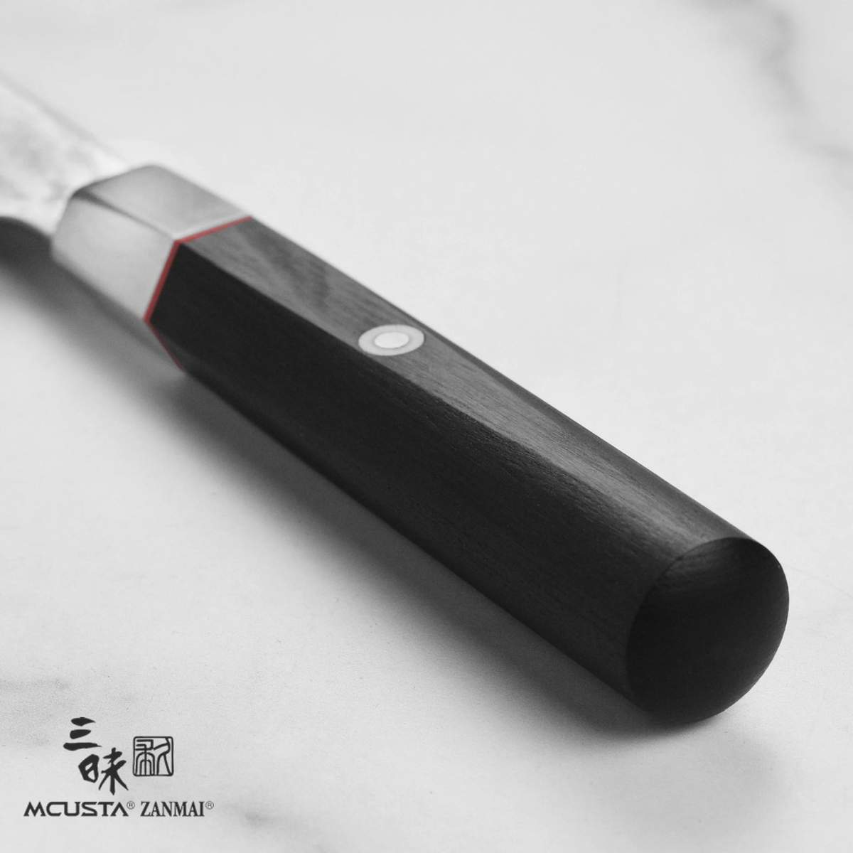 Coltello Petty 15 cm Mcusta Zanmai Hybrid Damascus Splash HZ2-3002DS - immagine 6