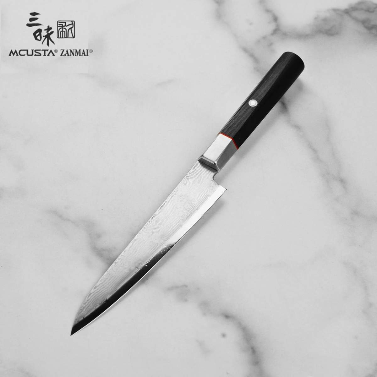 Coltello Petty 15 cm Mcusta Zanmai Hybrid Damascus Splash HZ2-3002DS - immagine 4